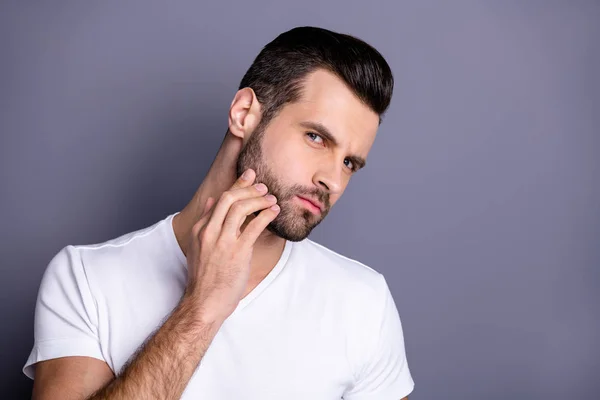 Close up photo amazing he he he he his macho perfect appearance touch arm hand bristle not sure quality stylist visit not smiling look mirror bath shower wear casual white t-shirt isolated grey background — Foto de Stock
