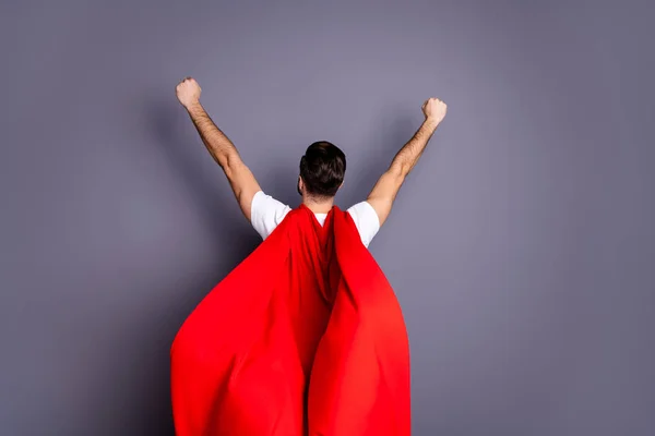 Rear back behind view portrait of his he nice cool perfect strong content macho powerful guy goal purpose rising hands up wind blows mantle isolated over gray violet purple pastel background — Stock Photo, Image