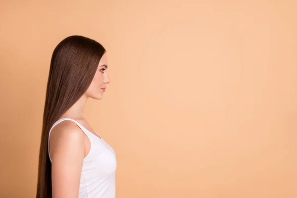 Profile side view portrait of her she nice-looking lovely sweet attractive glamorous winsome well-groomed gorgeous candid lady copy space isolated over beige background — Stock Photo, Image