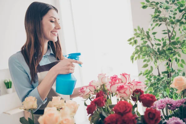 Profile side view photo of cute charming nice lady people hold hand look feel content dressed blue stylish trendy shirt beautiful orangery greenhouse — Stock Photo, Image