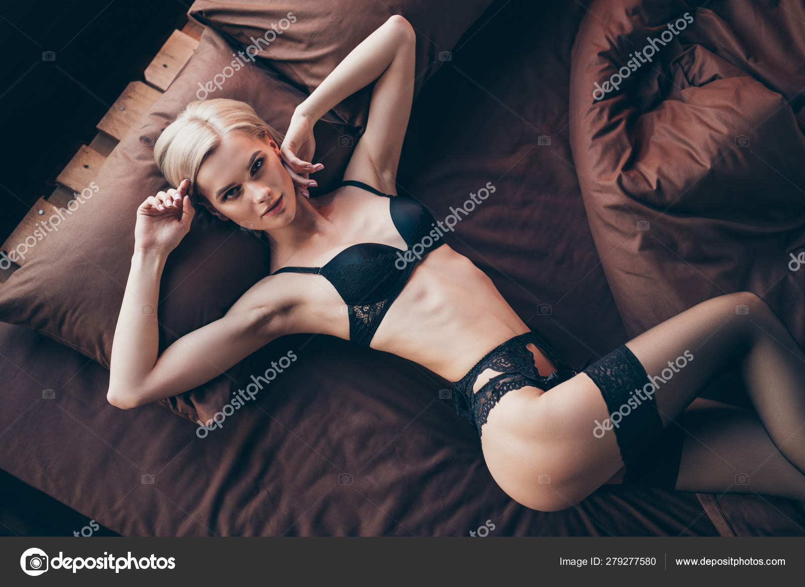 Top above high angle view of her she nice-looking curvy feminine attractive lovely lovable fit slim thin shape figure model lying on bed posing waiting husband boyfriend in hotel house Stock Photo picture