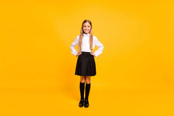 Full length body size view of her she nice-looking attractive cheerful cheery straight-haired pre-teen girl hands on hips isolated over bright vivid shine yellow background — Stock Photo, Image