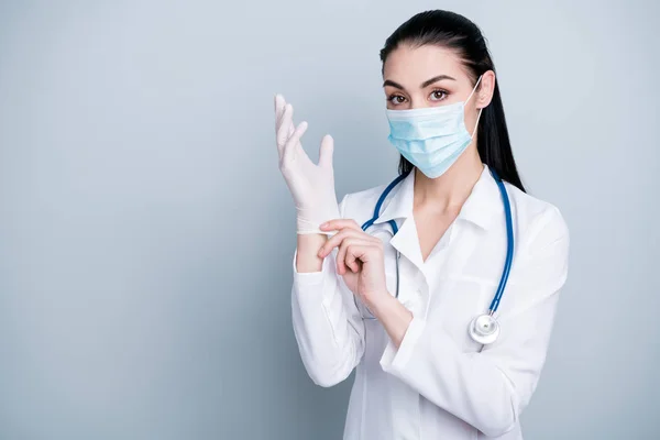 Close up photo beautiful she her lady doctor hospital preparing operation check equipment wearing facial mask rubber gloves phonendoscope white science costume isolated grey background — Stock Photo, Image