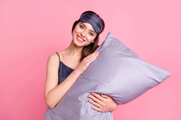 Close-up portrait of her she nice-looking attractive lovely peaceful tender cheerful cheery straight-haired teenage girl embracing pillow isolated over pink pastel background — Stock Photo, Image