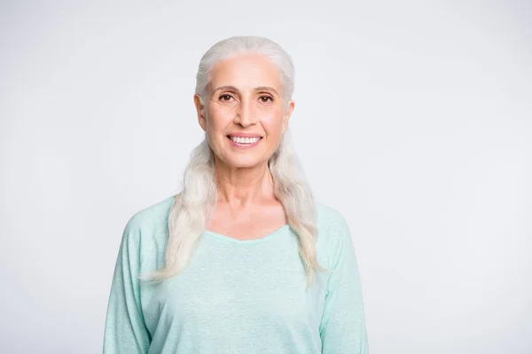 Portrait of pretty person smiling looking wearing teal pullover isolated over white background — Stok Foto