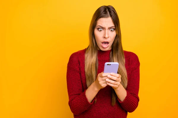 Photo of pretty lady holding telephone hands read bad news wear knitted pullover isolated yellow background — Stock Photo, Image