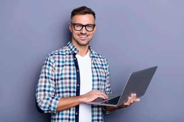 Close up photo handsome attractive he him his cheer guy hands arms hold notebook writing checking letters colleagues partners stylish look wear casual plaid checkered shirt isolated grey background