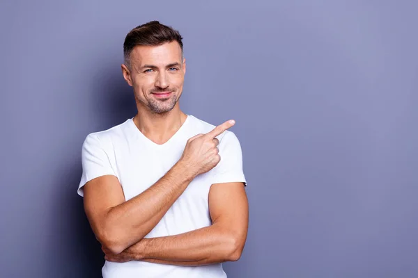 Close up photo amazing he him his middle age macho perfect appearance hand arm index finger direct empty space sincere funny cheerful charming wear casual white t-shirt isolated grey background — Stock Photo, Image