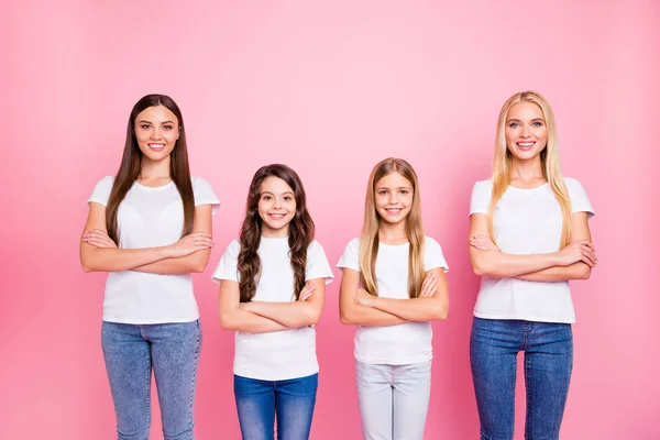 Two little and two students ladies crossing arms wear casual outfit isolated pink background — Stock Photo, Image