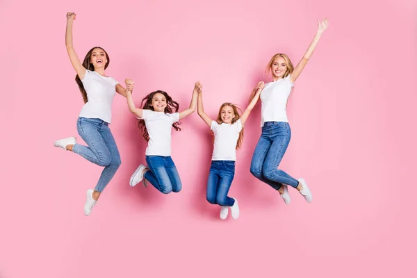 Full length body size view of four nice attractive lovely slim fit cheerful glad long hair girls having fun spending holiday weekend holding hands motherhood isolated on pink background — Stock Photo, Image