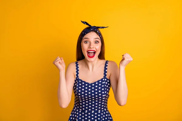 Portrait of cute feminine lady raise fists scream shout yeah isolated over yellow background — Stock Photo, Image