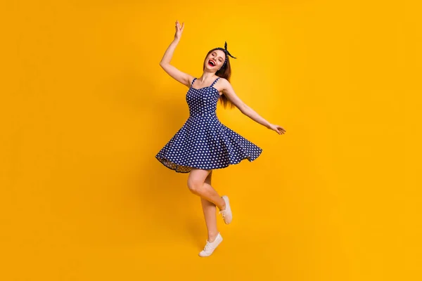 Full length body size view of her she nice good-looking attractive lovely slim fit smart glad cheerful straight-haired girl having fun free spare time isolated on bright vivid shine yellow background — Stock Photo, Image
