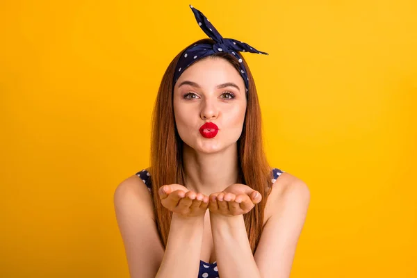 Photo of amazing foxy lady red pomade send air kiss boyfriend wear casual dotted dress headband isolated vivid yellow background — Stock Photo, Image
