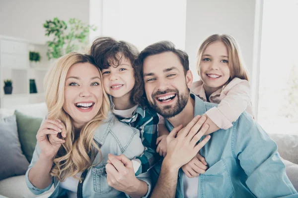 Photo of four family members after adoption having best time rejoicing sit couch living room indoors — Stock Photo, Image