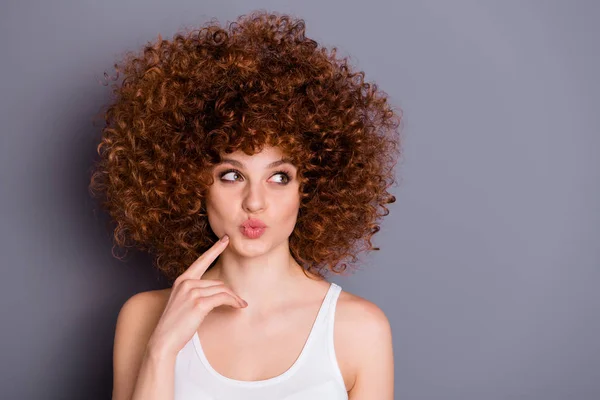 Close up photo of lovely lady touch finger chin air blow lips wear singlet isolated over grey background Royalty Free Stock Images