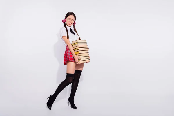 Full length side profile body size photo beautiful she her teacher lady hold many book diligent student tails pushing hard wear specs short red checkered costume pantyhose isolated white background — Stock Photo, Image