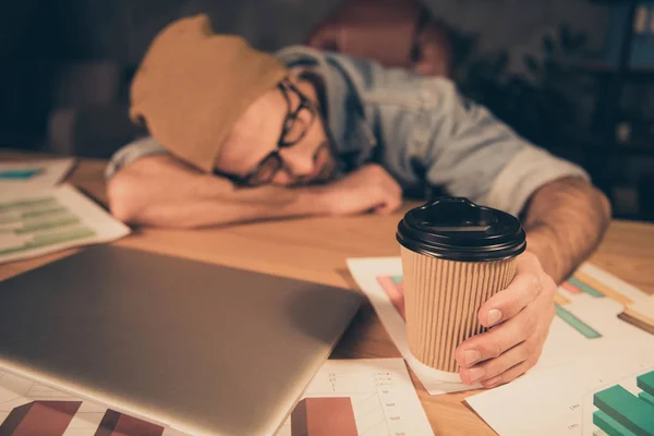 Photo of learning at dark time guy fell asleep hot energy beverage not helping wear casual outfit lying on table — Stock Photo, Image
