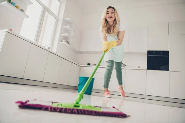 Full length body size view portrait of her she nice attractive lovely content cheerful cheery wavy-haired lady making professional cleanup in light white interior kitchen — Stock Photo, Image