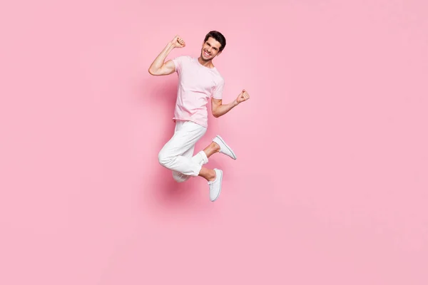 Full length photo of pretty person raising fist screaming yeah isolated over pink background — Stock Photo, Image