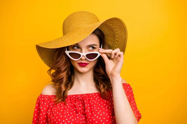 Angry lady look window dislike rainy weather wear red dress sun specs and hat isolated yellow background — Stock Photo, Image