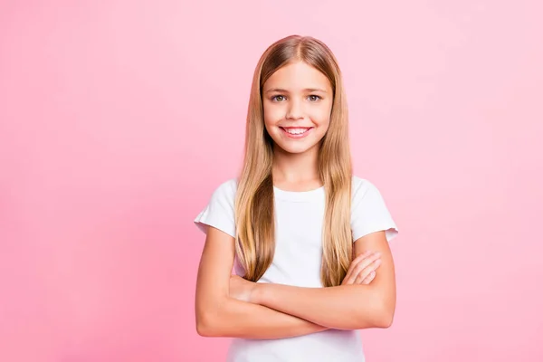 Photo of confident little girl showing brilliant intelligence for her age while isolated with pink background — Stock Photo, Image