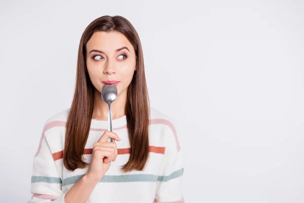 Very hungry lady holding spoon into mouth dream of tasty meal wear striped pullover isolated white background — Stock Photo, Image