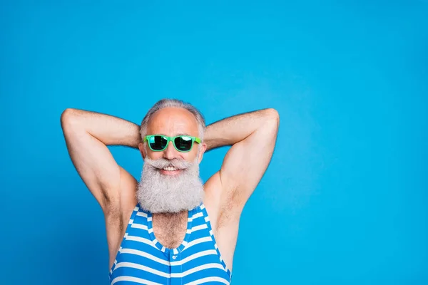 Close-up portrait of his he nice attractive content cheerful cheery gray-haired man spending summertime life lifestyle poolside hotel isolated over bright vivid shine turquoise blue background — Stock Photo, Image