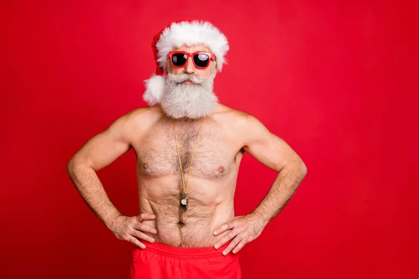 Portrait of his he nice attractive handsome content sporty muscular bearded virile gray-haired macho hands on hips spa resort trip rescue save isolated on bright vivid shine red background — 图库照片