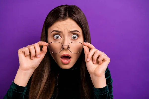 stock image Close up photo of impressed lady touching her eyewear eyeglasses scream shouting wearing black turtleneck isolated over purple violet background