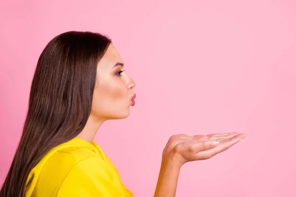 Close up photo of attractive cheerful cute pretty sweet girlfriend sending away air kiss to someone while wearing sportswear bright and yellow isolated with pink pastel color background — Stock Photo, Image