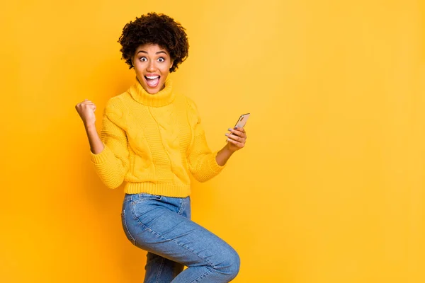 Copyspace photo of brown excited ecstatic cheerful cute charming nice girlfriend black blogger wearing jeans denim jumper overjoyed with someone starting following her isolated with bright background — Stock Photo, Image