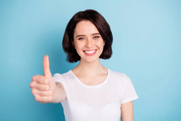 Close-up portrait of her she nice attractive content cheerful cheery girl showing thumbup ad advert solution isolated on bright vivid shine vibrant blue turquoise color background — Stock Photo, Image