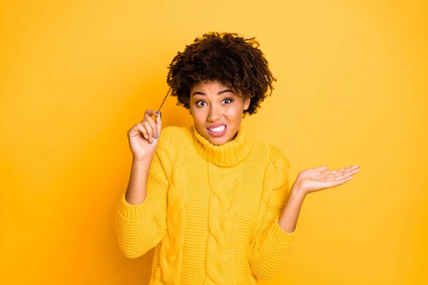 Photo of trendy misunderstanding dandruff haired girlfriend wearing yellow jumper not knowing how to care about hair while isolated with bright color background — Stock Photo, Image