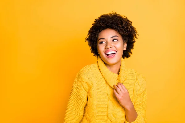 Photo of pretty dark skin lady listening humorous story wear warm knitted jumper with big collar isolated yellow color background — Stock Photo, Image