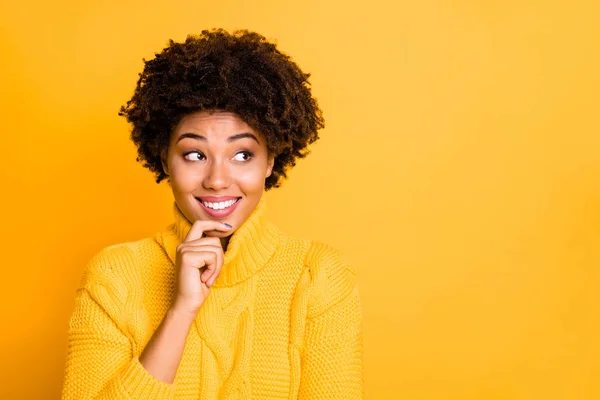 Closeup photo of dark skin thoughtful lady looking empty space wear warm knitted jumper isolated yellow background — Stock Photo, Image