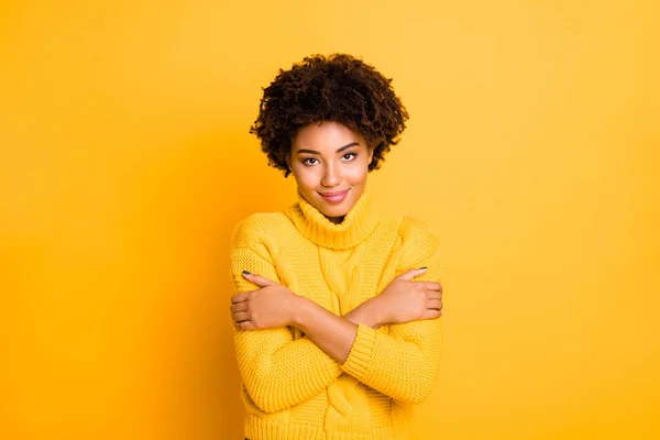 Photo of pretty dark skin lady holding hands on shoulders want some hugs wear warm knitted sweater isolated yellow background — Stock Photo, Image