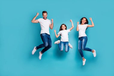 Full length body size photo of funny funky trendy lucky fortunate family triumphing while isolated with blue background clipart