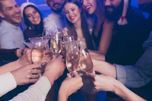 Cropped close-up view of nice attractive cheerful cheery positive girls and guys having fun rest relax clinking wineglass congrats winter December in luxury place nightclub indoors — Stock Photo, Image