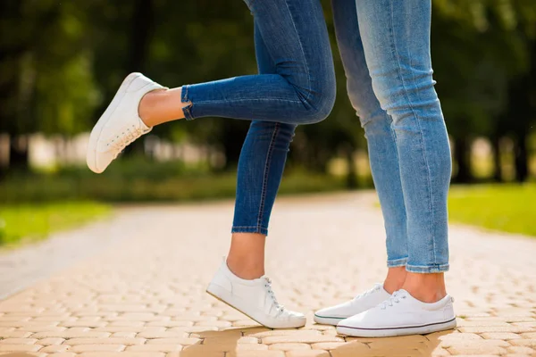 Cropped photo of charming pair legs stop in park for romance moment wear denim outfit — Stock Photo, Image
