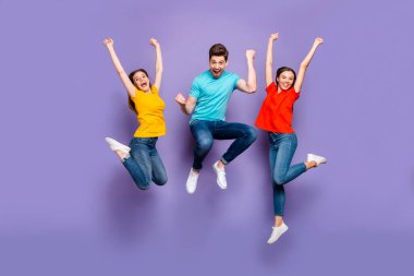 Full length size body photo of three funny funky ecstatic excited delightful buddies having fun on weekend isolated violet background clipart