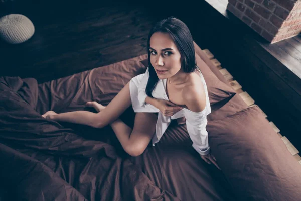 Above high angle view of her she nice-looking attractive lovely lovable pretty nude girl sitting on bed bare foot teasing undressing at industrial brick wood loft modern interior style flat house — Stock Photo, Image