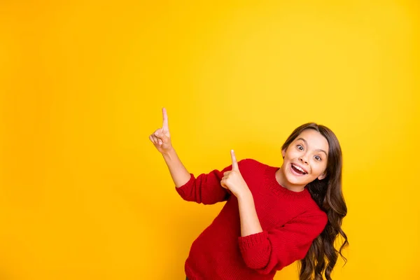 Portrait of funky positive cheerful kid promoter feel crazy point index finger copy space recommend adverts present feedback choose decide promo wear stylish jumper isolated yellow color background — Stock Photo, Image