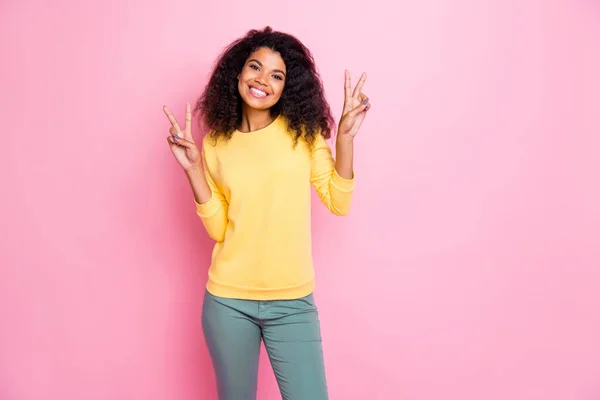 Whats up guys. Photo of excited charming nice glad positive optimistic enjoying her day hipster giving double v-sign symbol wearing grey color trousers isolated pastel background — Stock Photo, Image
