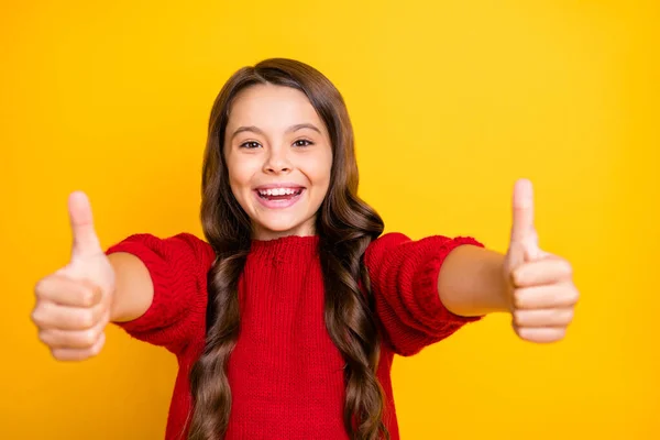 Close up photo of positive cheerful emotion funky kid show thumb up enjoy ads give feedback choice decisions recommend promo wear style lifestyle jumper isolated over yellow color background — Stock fotografie