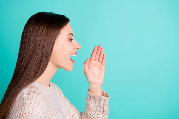 Copyspace photo of charming cute nice cheerful trendy charming girlfriend announcing something standing side profile isolated over teal vivid color background — стоковое фото