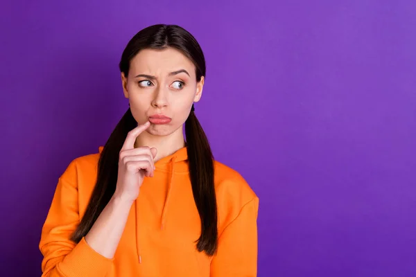 Close-up portrait of her she nice attractive lovely cute disappointed doubtful girl touching lip thinking isolated over bright vivid shine vibrant violet purple lilac color background — ストック写真