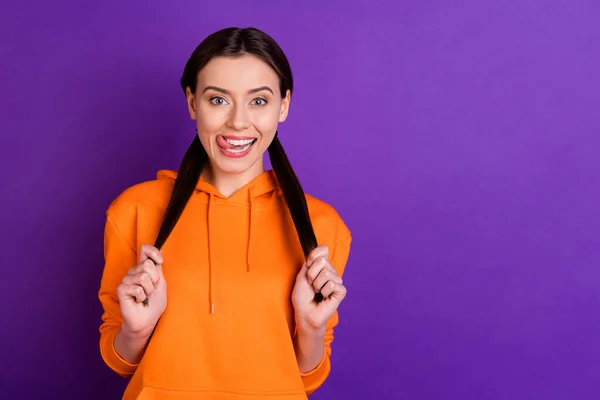 Portrait of her she nice attractive lovely cute girlish funny cheerful cheery girl touching ponytails licking lip isolated over bright vivid shine vibrant violet purple lilac color background — ストック写真