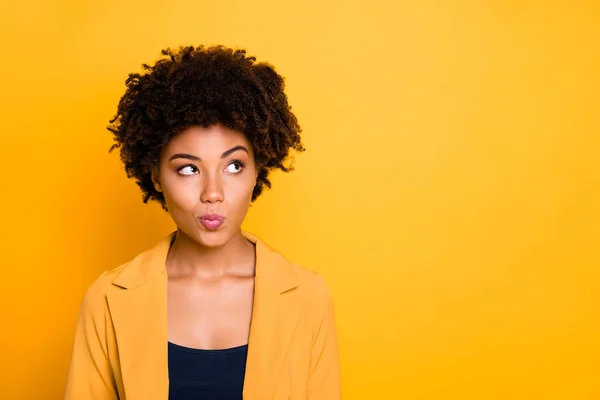 Close-up portrait of her she nice attractive lovely charming pretty cute curious wavy-haired girl thinking deciding pout lips isolated over bright vivid shine vibrant yellow color background — 스톡 사진