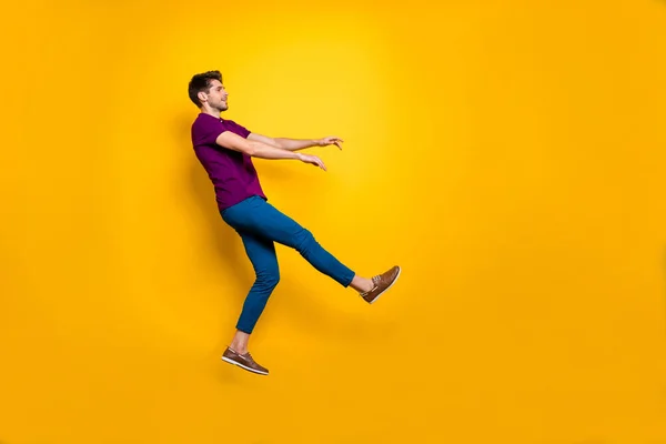 Full length body size side profile photo of kick man having been fired away from job flying back isolated over yellow vivid color background — Zdjęcie stockowe