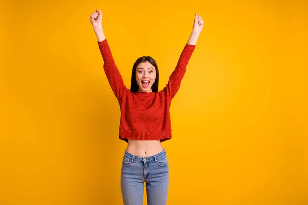 Photo of cute charming nice cheerful girlfriend with her hands up having waited for sales wearing jeans denim isolated over vivid color yellow background — Stockfoto